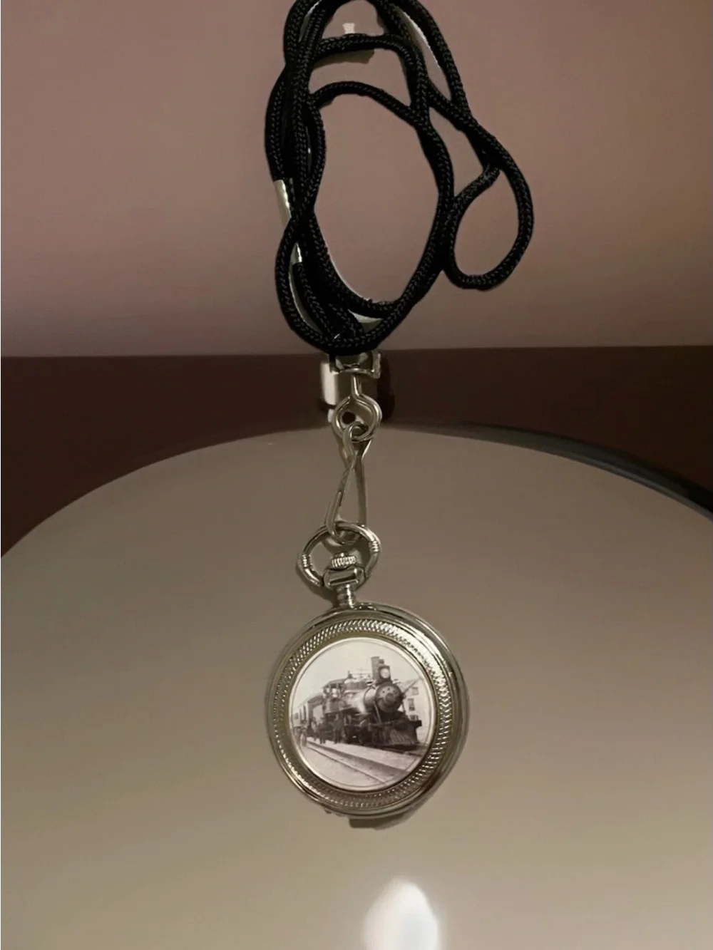 Silver-tone Pocket Watch Pendant with Train Illustration